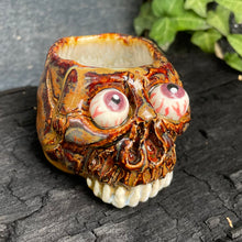 Load image into Gallery viewer, Creepy Peepers Skull Shot Glass in Buried Brown