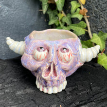 Load image into Gallery viewer, Creepy Peepers Horned Skull Shot Glass in Midnight Blue or Lilac Haze
