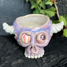 Load image into Gallery viewer, Creepy Peepers Horned Skull Shot Glass in Midnight Blue or Lilac Haze
